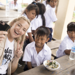 KATE HUDSON WITH CAMBODIAN CHILDREN CANDID