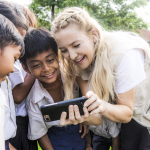 KATE SHOWING CAMBODIAN CHILDREN PICTURES