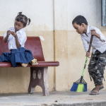 BOY CLEANING UP AT SCHOOL WITH GIRL 