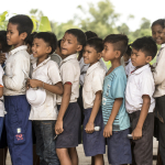 BOYS LINE UP FOR LUNCH LINE